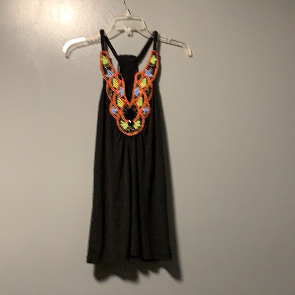 Six Degrees 95% polyester and 5% if spandex in a size M.